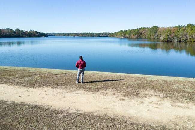 The view of the lake at Sunset Lake Park lends itself to reflection.