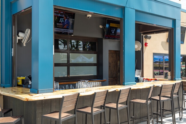 The Deal Lake Bar + Co has a relaxed outdoor patio and bar for meeting with friends.