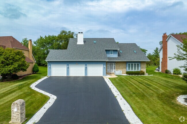 Three car garages and massive yards can be found in newly built homes in Olympia Fields.