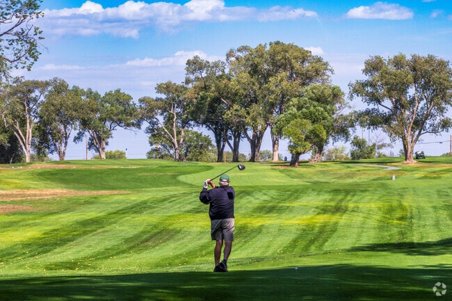 Locals can enjoy a day on the greens at the Santa Fe Country Club nearby Nava Ade.