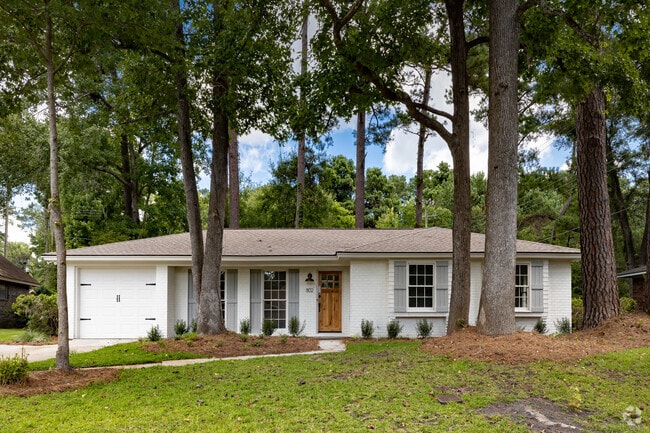 Located in Windsor Forest, this beautifully renovated brick ranch-style home offers timeless appeal and contemporary comfort.