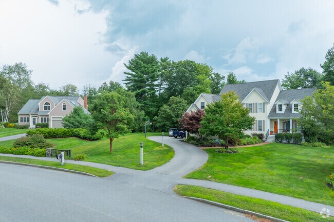 Many properties in East Concord are surrounded by leafy green lawns and large trees.