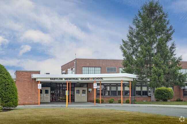 The Babylon Memorial Grade School in Babylon, NY has approximately 465 students.