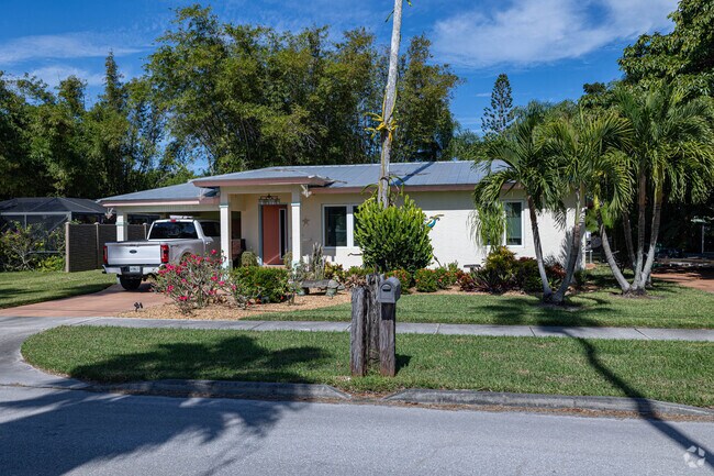Modest ranch single homes in Saint Lucie Village are within walking distance of the Indian River.