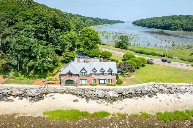 This fantastic waterfront mansion is at the end of the causeway in Lloyd Harbor.