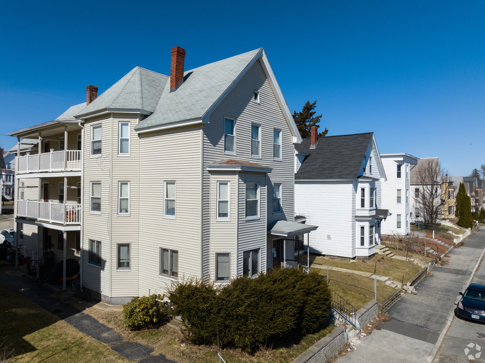 A row of 3 story homes in the Notre Dame neighborhood of Manchester.