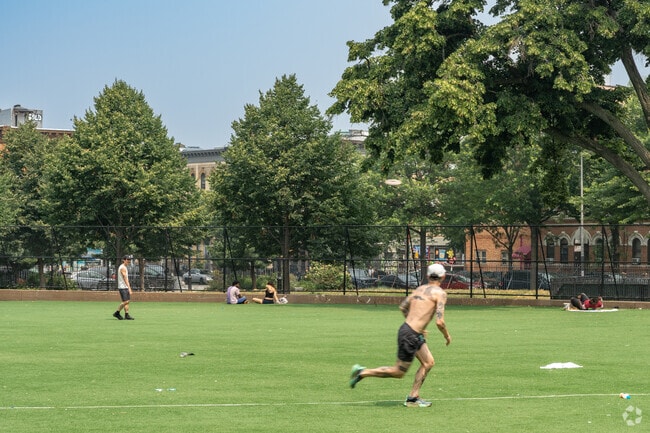 Throw your frisbee around at the Maria Hernandez Park athletic field.