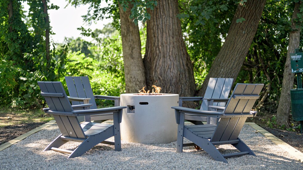 Discover relaxation by our community fire pit, where the glow of the flame adds an extra layer of charm.