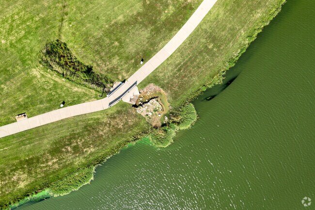 Walking paths around School Street Pond offer Rose Hill residents a peaceful place to unwind.