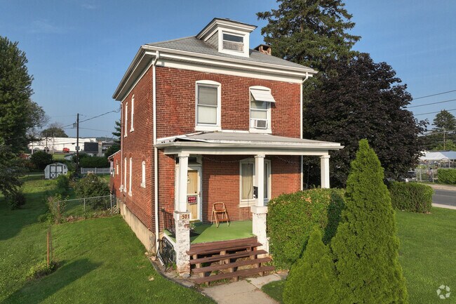 You can find charming brick homes with porches in Hyde Park.