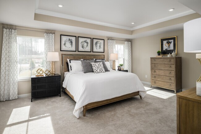 You deserve to rest comfortably in your roomy owner’s suite featuring walk-in closets and en suite bathroom.