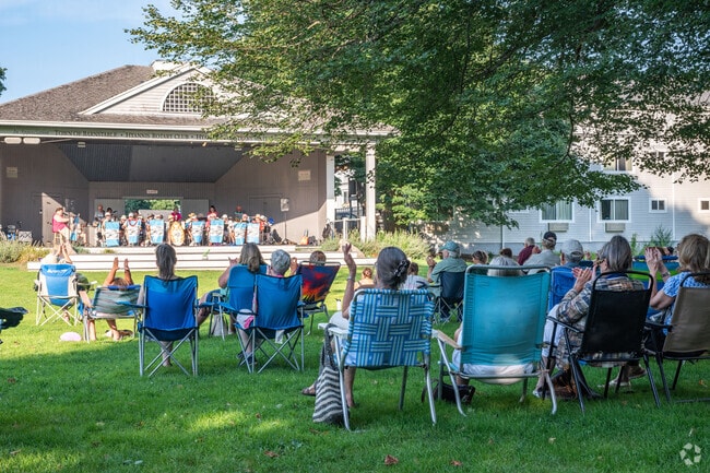 Hyannis residents pack the lawn to listen to the Cape Cod Ukulele Club.