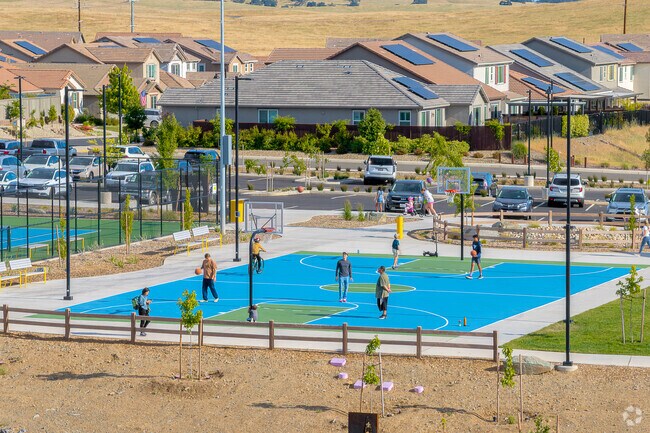 Friends from Folsom Ranch gather at the Prospector Park basketball courts for an evening of fun.