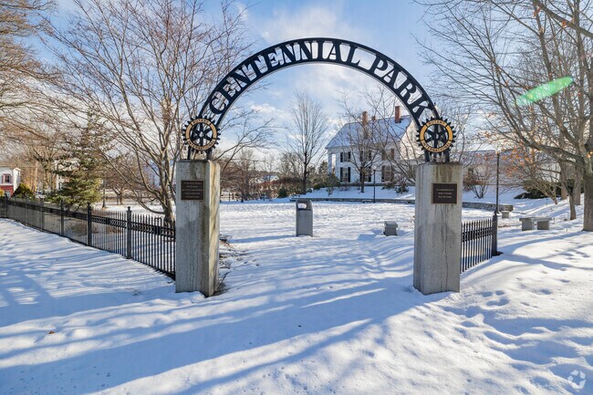 Centennial Park’s entrance welcomes visitors with a fresh layer of winter snow.