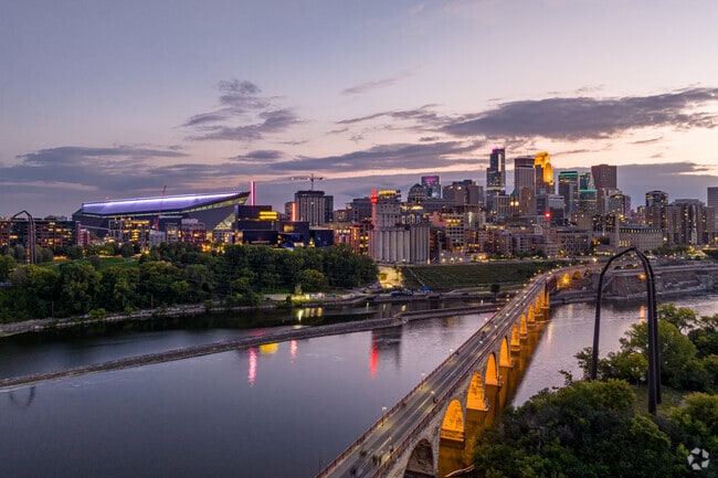 The Stone Arch Bridge lights the way to Downtown Minneapolis is about 10 miles from Grandview via I-94 and Route 100.