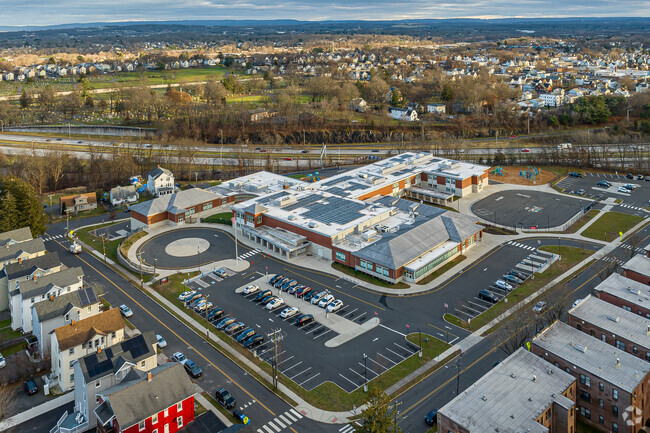 Smalley Academy has a population of 591 students.