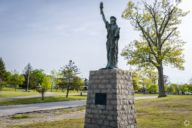A sculpture resembling Lady Liberty stands in Kenny Park, near the Saint Annes neighborhood.
