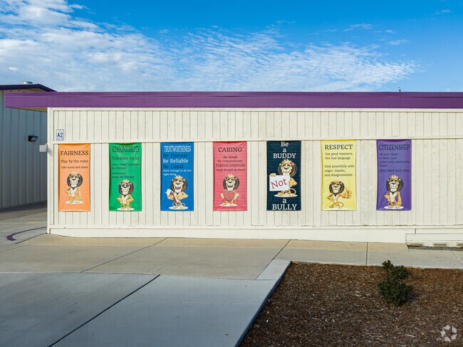 Several banners at Golden Valley Elementary School remind students of good behavior.