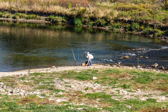 Pine Ridge offers peaceful fishing spots by the river, ideal for outdoor enthusiasts.