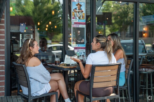 Sit outside and chat with friends at World of Beer in Tuscaloosa.
