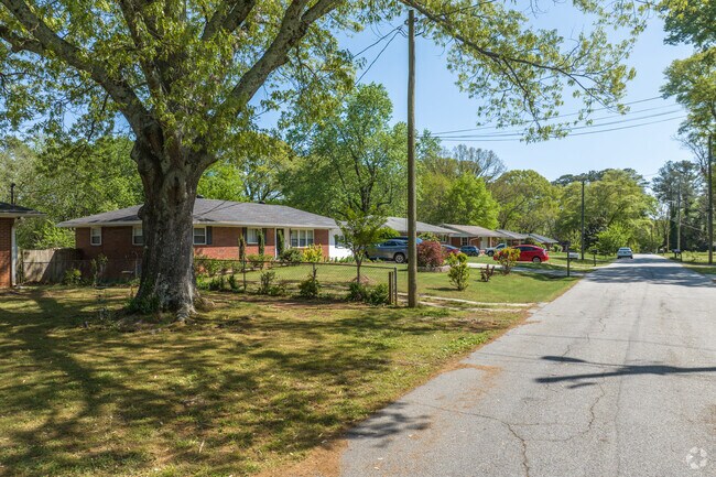 You'll find ranch style homes lined up along the wide wooded streets of Powers Park.