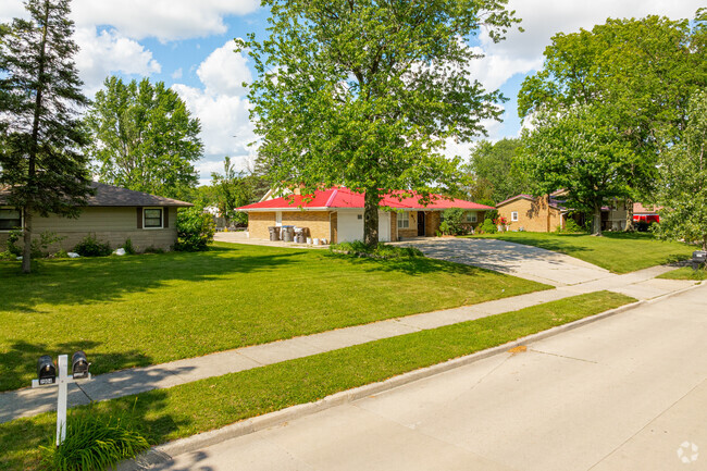 Hickory Grove residents enjoy the shade of the neighborhoods mature trees.