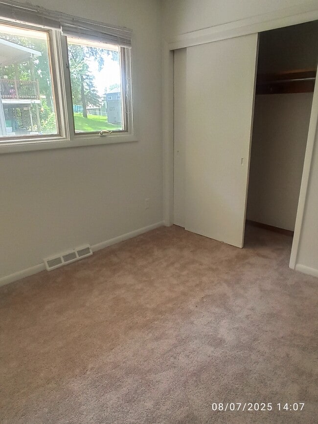 One of the two bedrooms. New carpet new paint