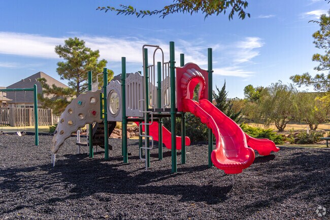 Kids run around in one of Covell-Danforth's community parks.