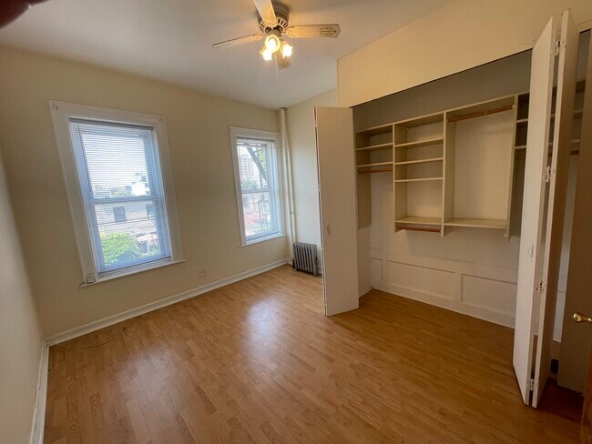 bedroom with built in closet organazier
