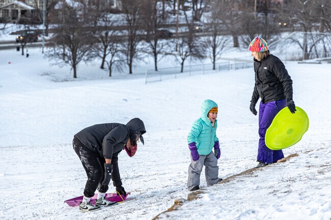 In the winter, Armour Fields kids and adults can be seen on the slopes of Brookside Park.