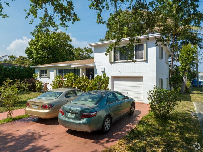 An eclectic-style, two-story single-family home is located in the Breezeswept Estates neighborhood.