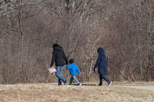 Acushnet Station residents unwind and explore nature at nearby Sawmill Park.