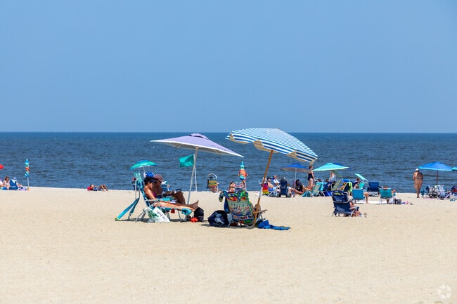 Bring the chairs and umbrellas to the peaceful beach in Loch Arbour.