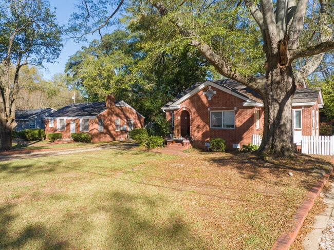 Towering, mature trees cast a soothing shade over the enchanting Forest Park neighborhood.