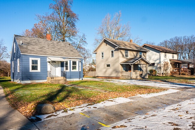 A row of Cape Cod and four square houses in North Triangle