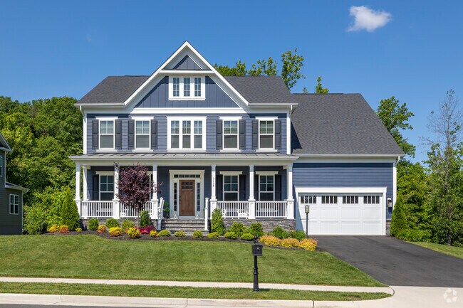 Beautiful landscaping and manicured lawns surround the elegant homes of Woodburn.