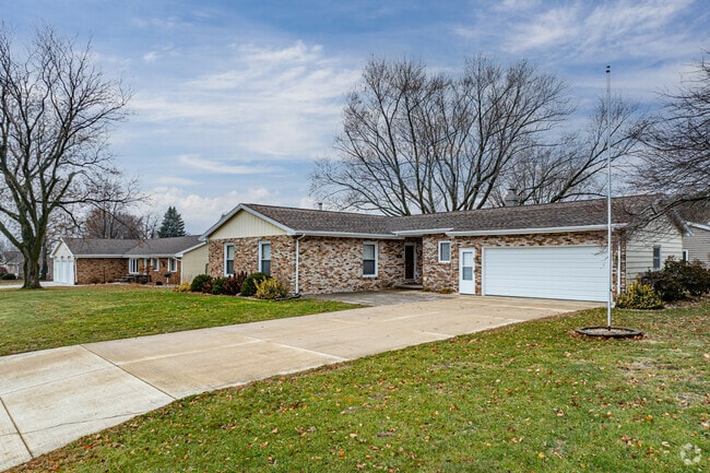 Brick-front ranch homes sit along tree-lined streets in Clarion.