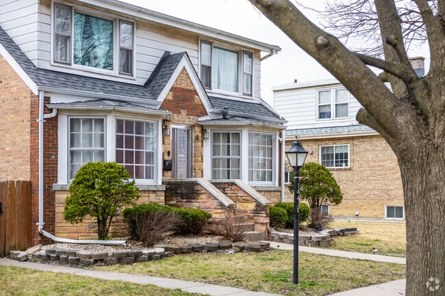 This traditional home in Posen shows the charming nature of the neighborhood.
