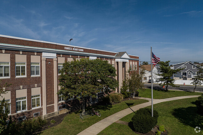The aerial shows the main walk way in front of the building.