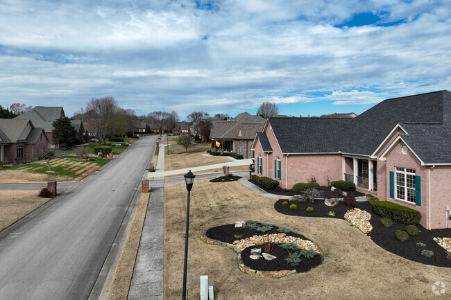 Grand one-story homes align the residential streets in the town of Alcoa, TN.