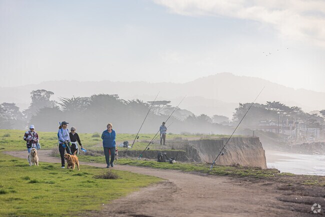 Family time along El Granada's picturesque Pacific shore.