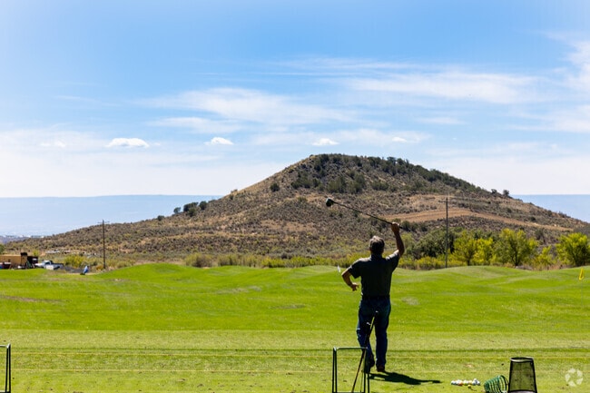 Golfers enjoy the views while playing at Cedaredge Golf Course.