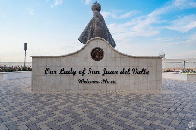 Our Lady of San Juan del Valle bronze statue stands in the San Juan neighborhood.