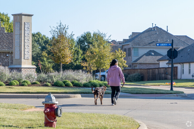 The streets of Melissa are a safe place to walk your dogs on a nive sunny day.