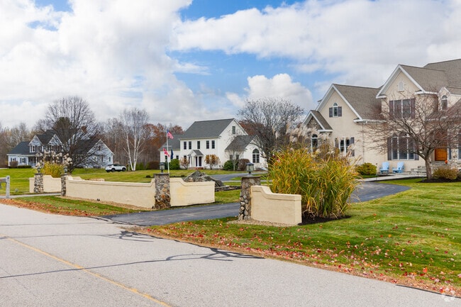 Large homes on wooded lots are common in Newington.