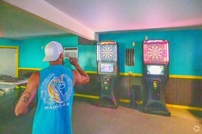 Try your hand at the dart boards inside the Tipsy Bayou Tavern in Presquille.