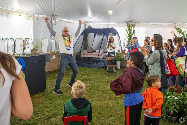 A magician does tricks for the families at The Somerset County 4-H Fai.