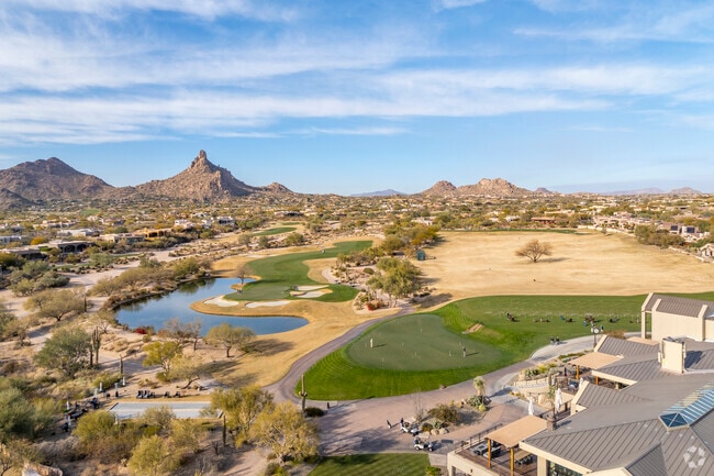 Members enjoy stunning views and top-tier facilities at Troon Country Club in Troon Village.