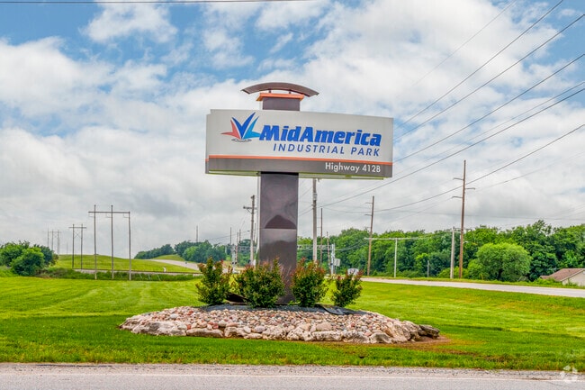 The Mid American sign welcomes visitors to one of Pryor Creek's major business hubs.