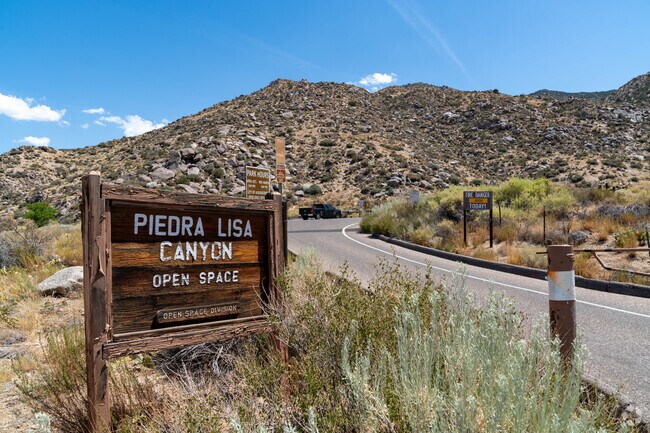Piedra Lisa Trailhead provides entry to Sandia Mountain Wilderness, offering fun for all ages near Enchanted Park.
